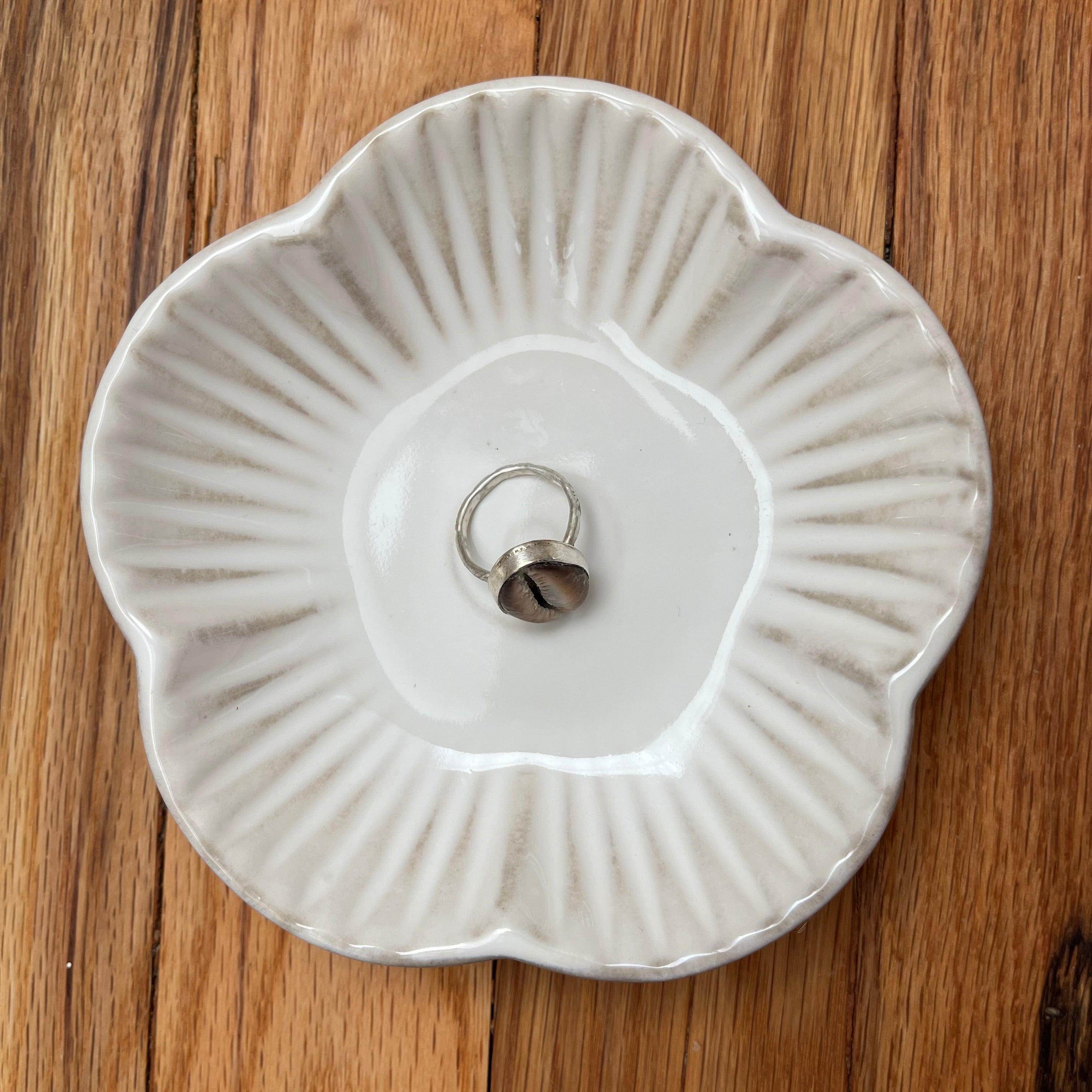 - Bezel Cowrie Shells Ring